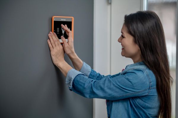 What configurations are necessary for setting up a home security system using Raspberry Pi and MotionEye?